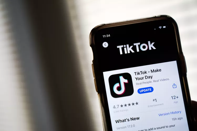 Smartphone displaying the TikTok app page on an app store, highlighting the TikTok Sale.