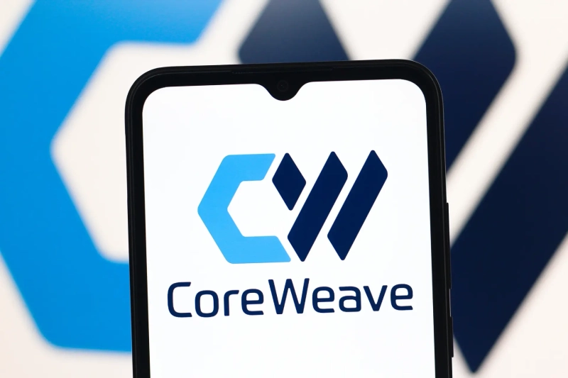 CoreWeave: logo on smartphone and background.