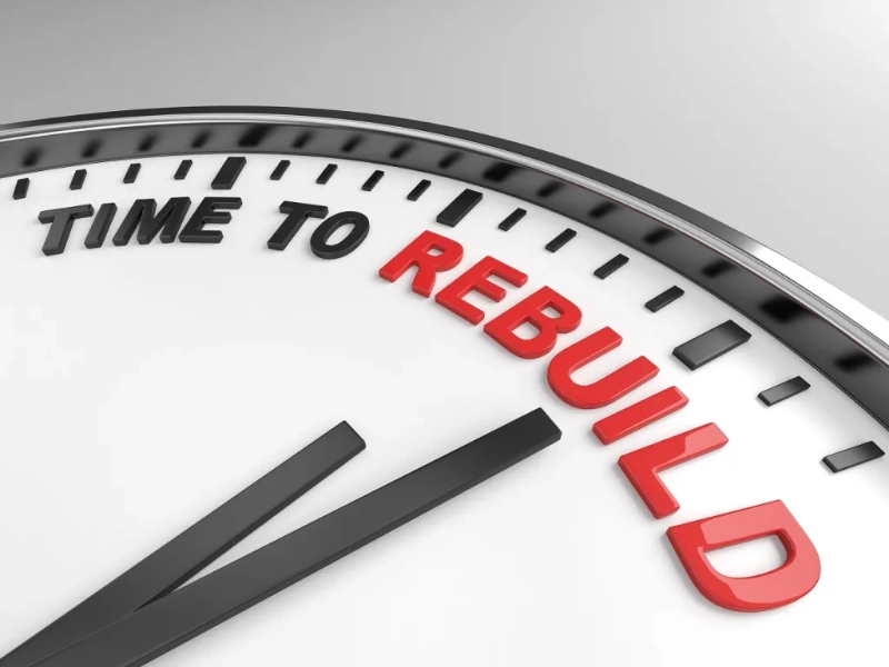 Clock face showing "Time to Rebuild" in bold letters, symbolizing new beginnings after probation.