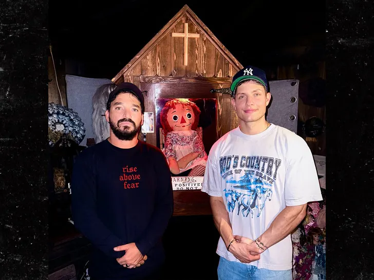 Matt Rife: with friend, Annabelle doll in wooden case, posed photo.