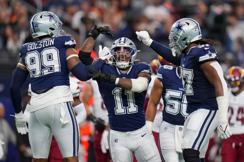 Micah Parsons: celebrating with Cowboys teammates Golston and others, AP Photo/Josh McSwain.