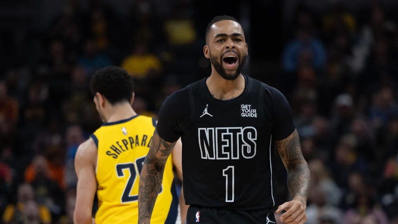 D'Angelo Russell, Nets #1, focused in game against Pacers, Trevor Ruszkowski-Imagn Images.