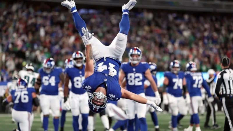 Giants #44 completes a touchdown backflip celebration in game against Eagles. Image credits: Getty Images