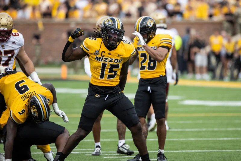 Mizzou football defender celebrates big play with teammates, Jay Biggerstaff.