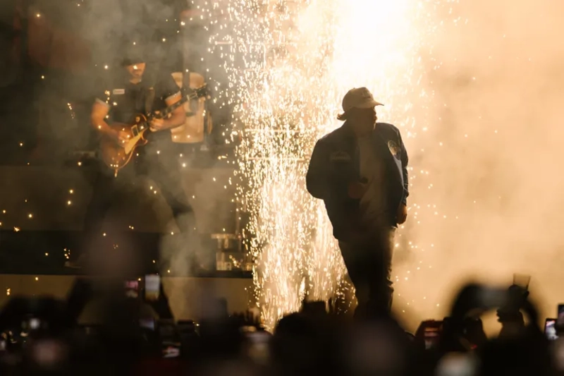 Morgan Wallen enters stage with pyrotechnics and crowd cheers during 2026 tour, Image Credits: Saskia Potter