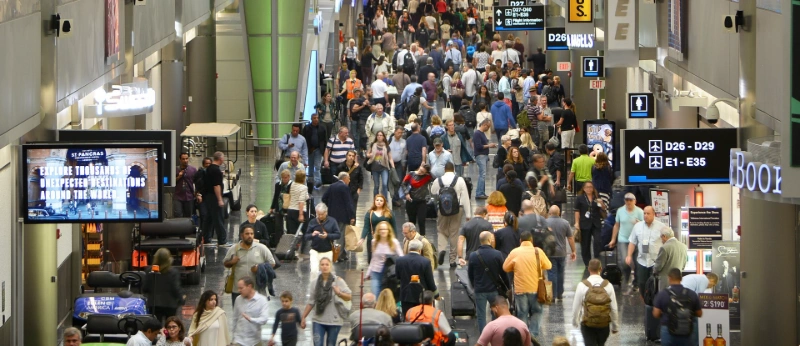 MIA Airport crowded terminal with travelers, image credits: Miami International Airport