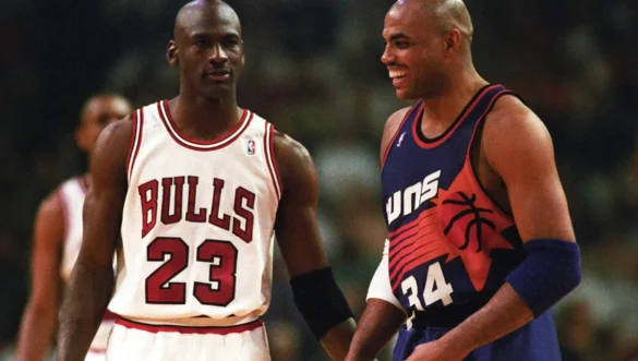Charles Barkley in a Suns jersey and Michael Jordan in a Bulls jersey during an NBA game. Credit: Rob Schumacher/The Republic related to Charles Barkley.