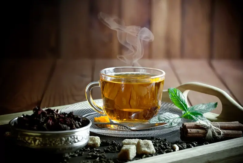 What is the tea used in Chinese restaurants: glass cup of tea with herbs and spices.