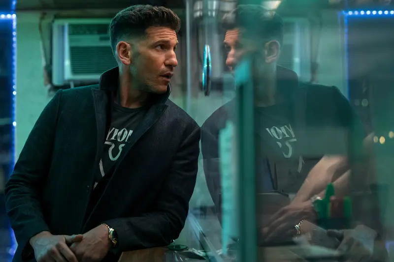 What is the cast of The Accountant 2: Jon Bernthal as Braxton Wolff in restaurant scene.