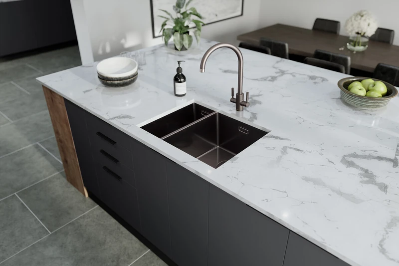 What is a deep sink: stainless steel deep sink in marble kitchen island.
