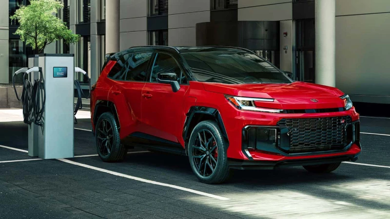 2026 Toyota RAV4 Hybrid: red SUV charging, new hybrid-only design.