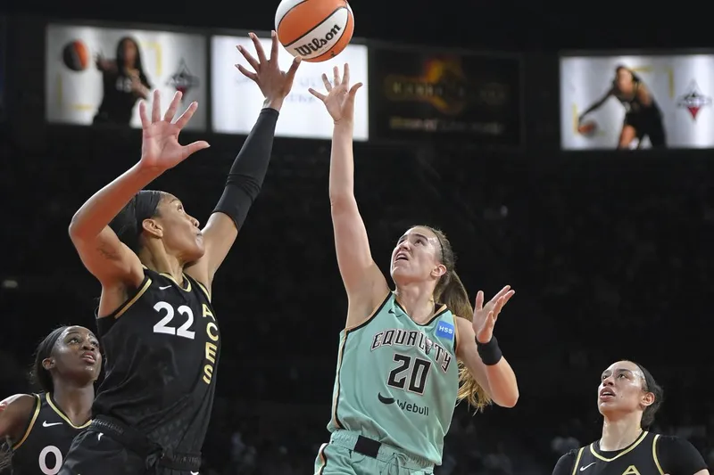 WNBA: Aces defend against Liberty shot during 2025 game.