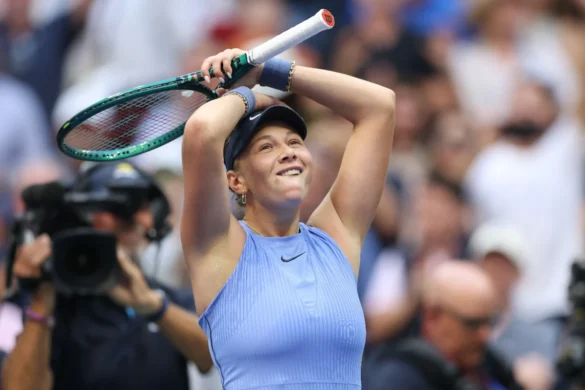 Anisimova celebrating a tennis victory on the court