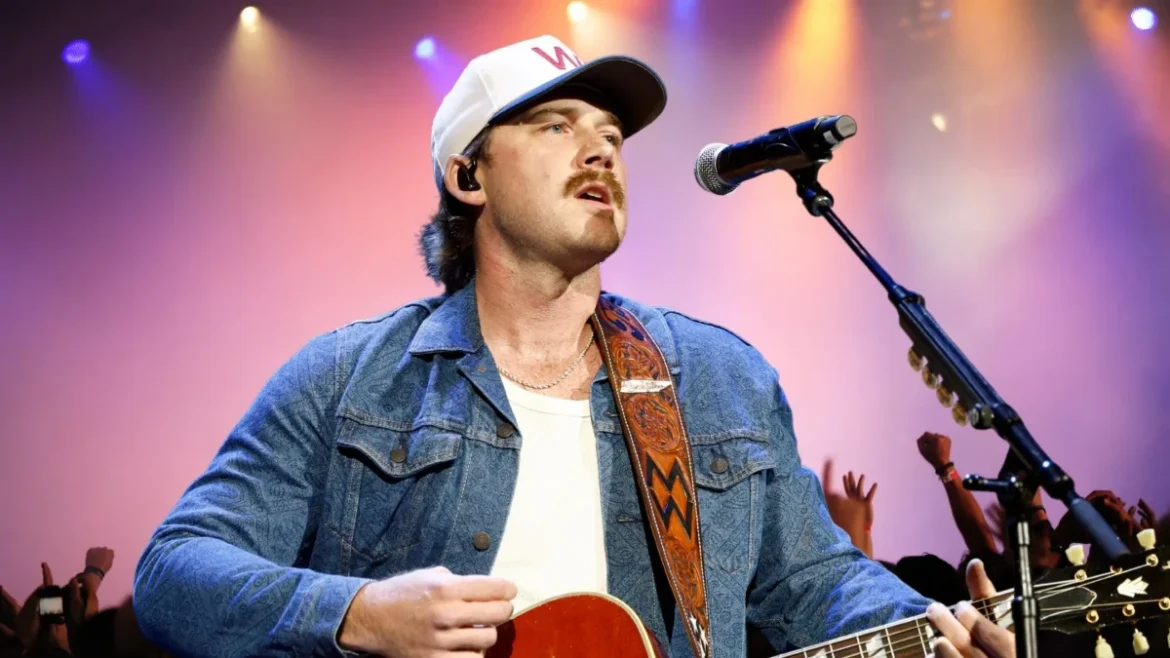 Morgan Wallen performs on stage with guitar during 2026 tour, Image Credits: Getty Images