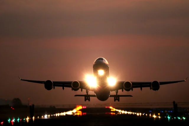 A passenger jet flying through the sky
