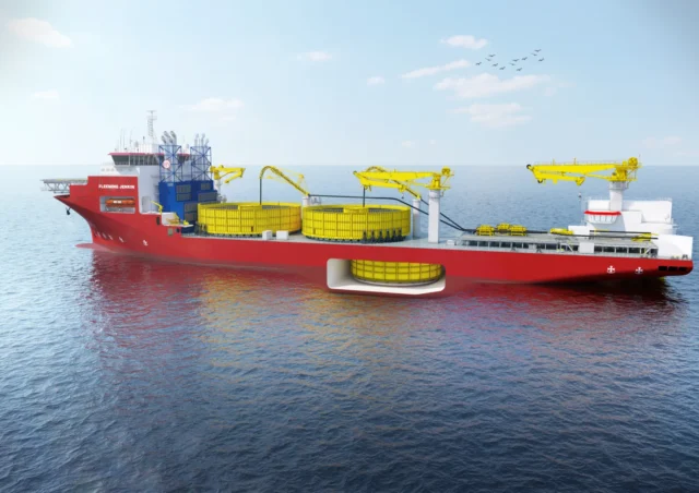 A ship laying an undersea communications cable at sea